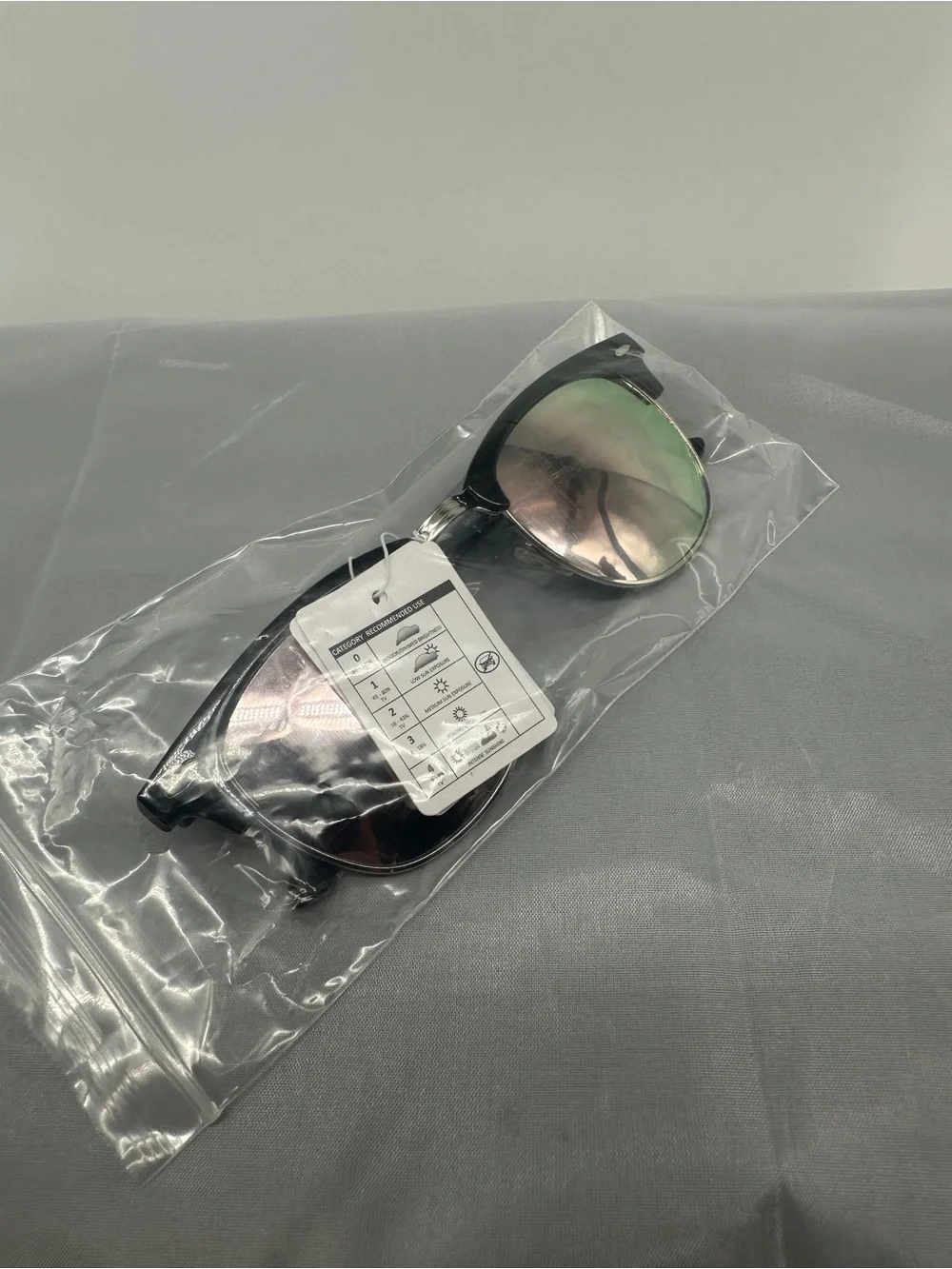 Black clubmaster sunglasses with mirrored lenses